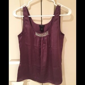 Sleeveless top with jeweled neckline